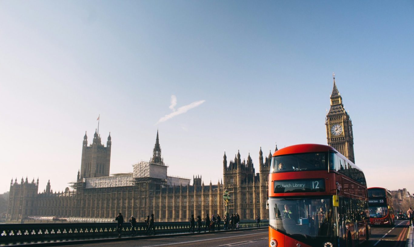 A London bus on Westminster Bridge with Big Ben in the background